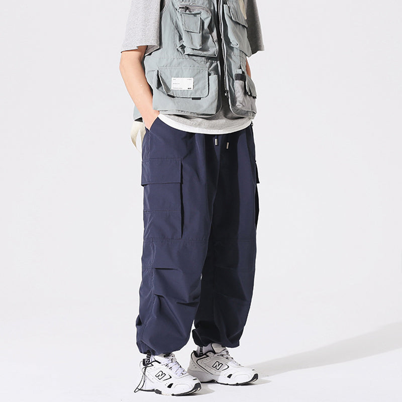 PLEATED KNEES LOOSE STRAIGHT TROUSERS