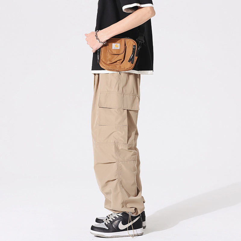 PLEATED KNEES LOOSE STRAIGHT TROUSERS