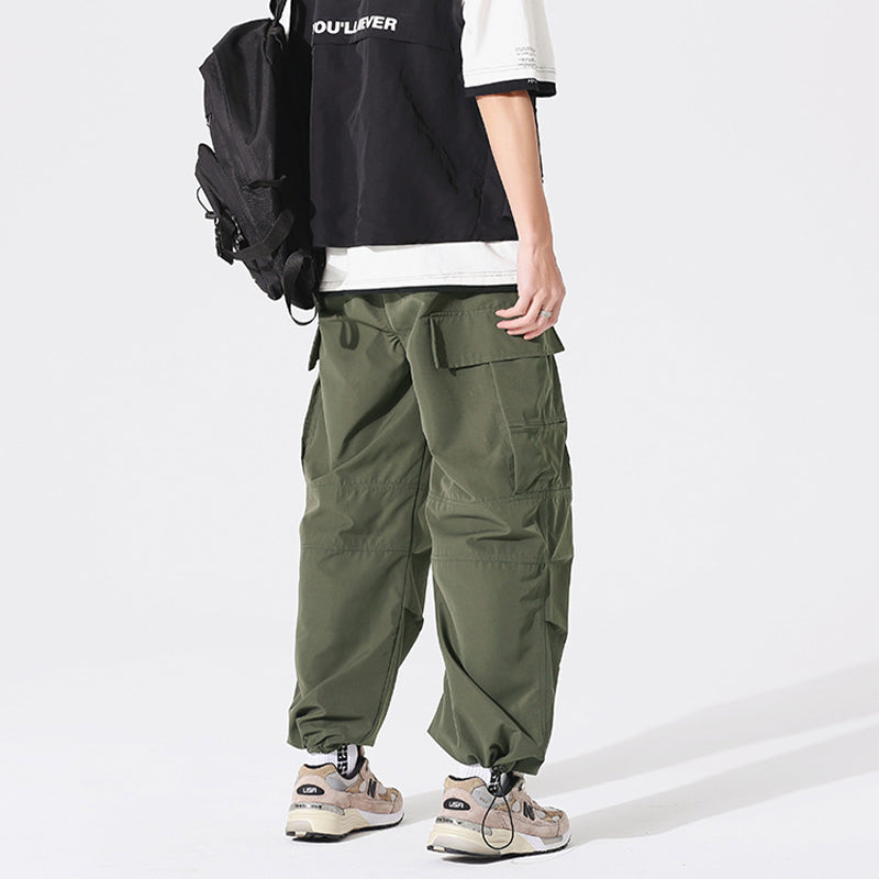 PLEATED KNEES LOOSE STRAIGHT TROUSERS