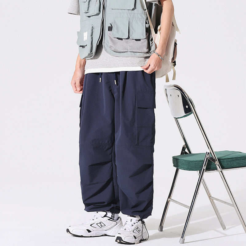 PLEATED KNEES LOOSE STRAIGHT TROUSERS