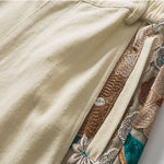 Load image into Gallery viewer, PANELED EMBROIDERED KNEE SHORTS
