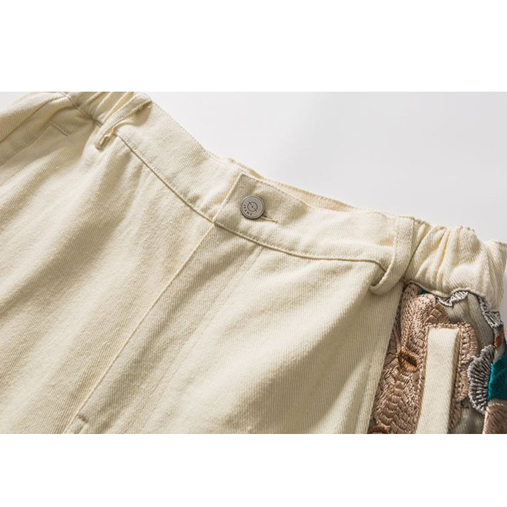 PANELED EMBROIDERED KNEE SHORTS