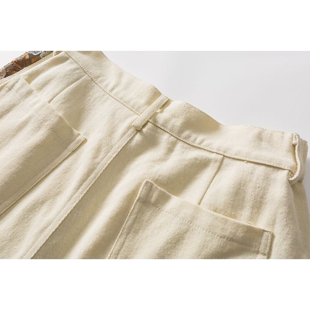 PANELED EMBROIDERED KNEE SHORTS