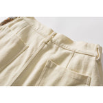 Load image into Gallery viewer, PANELED EMBROIDERED KNEE SHORTS
