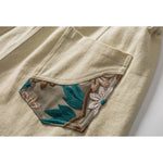 Load image into Gallery viewer, PANELED EMBROIDERED KNEE SHORTS
